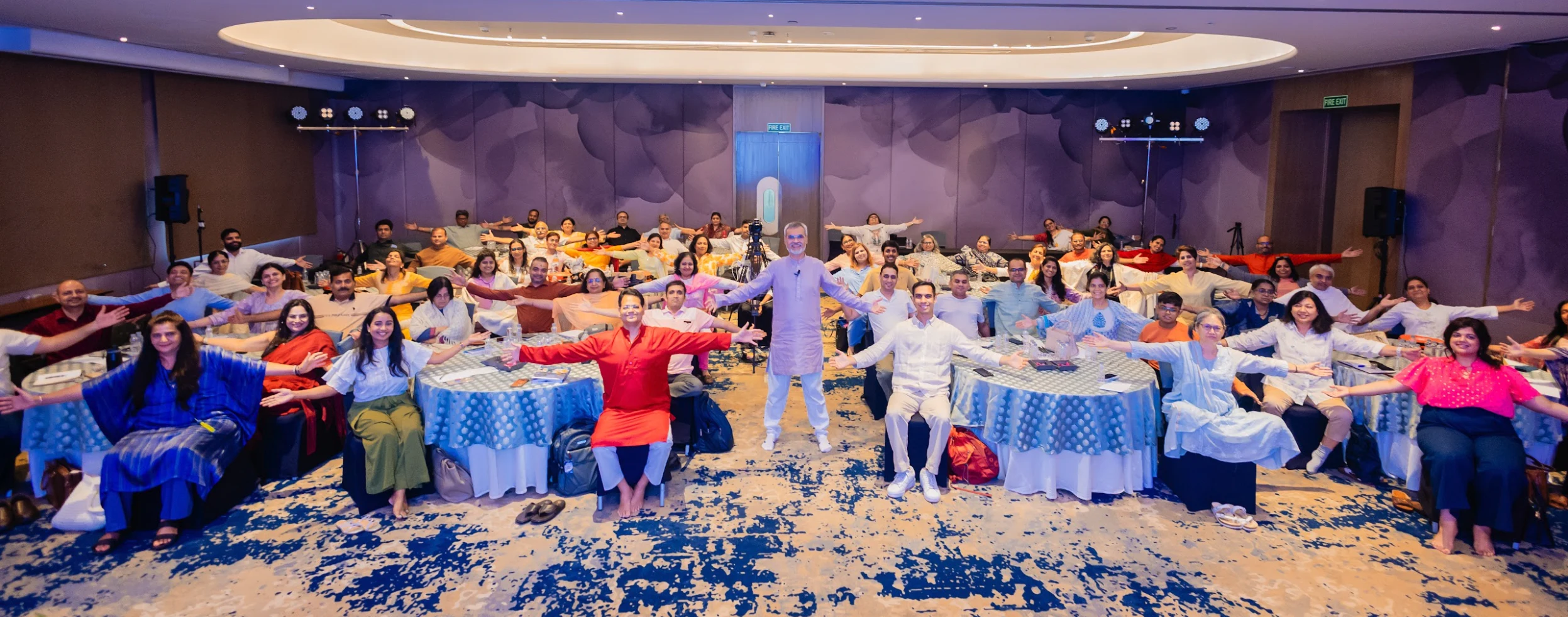 Group of Wellness Vibe workshop participants celebrating together