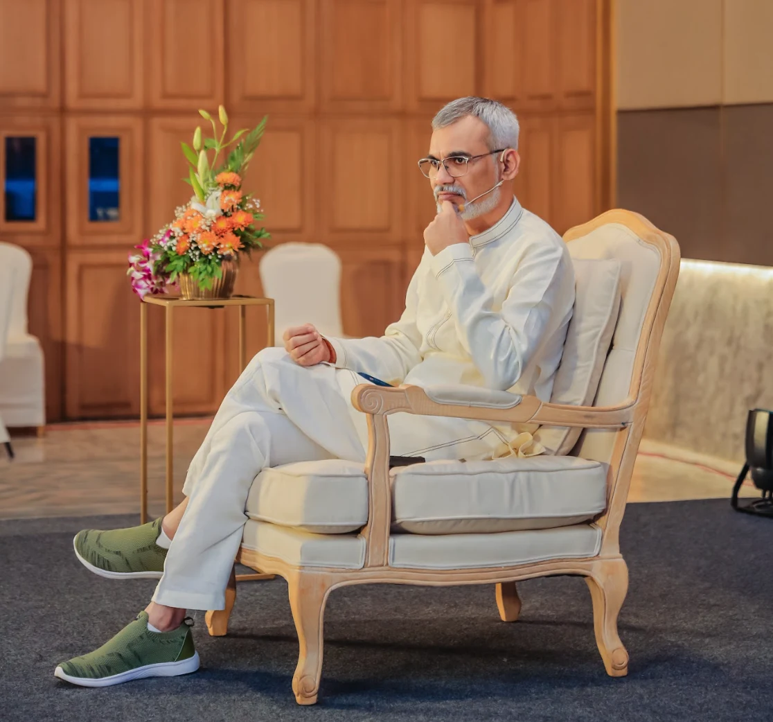 Vibhushri, founder of Wellness Vibe, seated in a reflective portrait