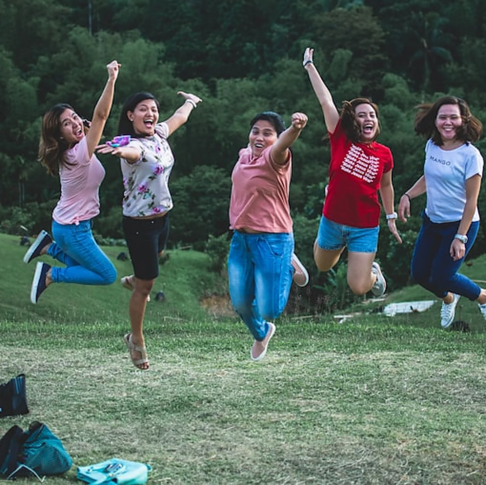 Group of young people celebrating outdoors