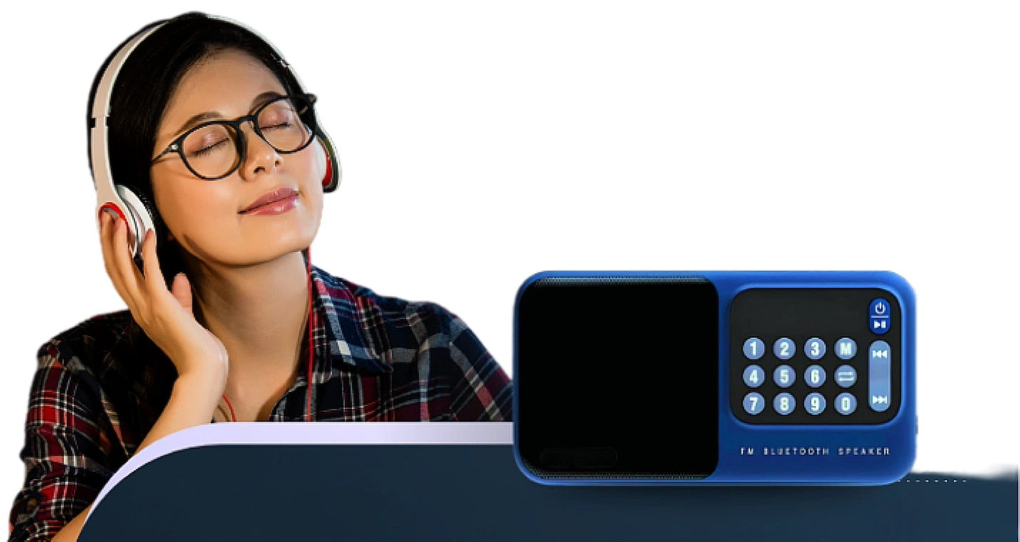 Woman listening with headphones next to Wellness Vibe FM Bluetooth speaker