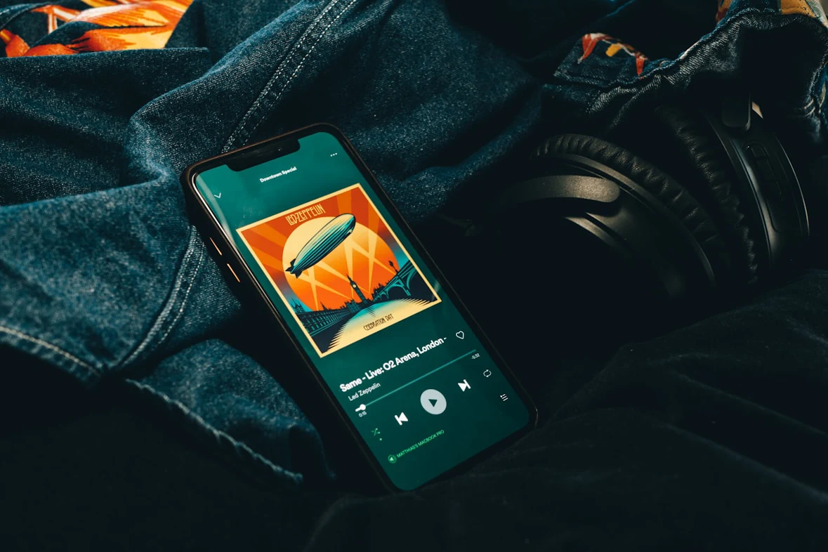 Phone screen showing Wellness Vibe app player