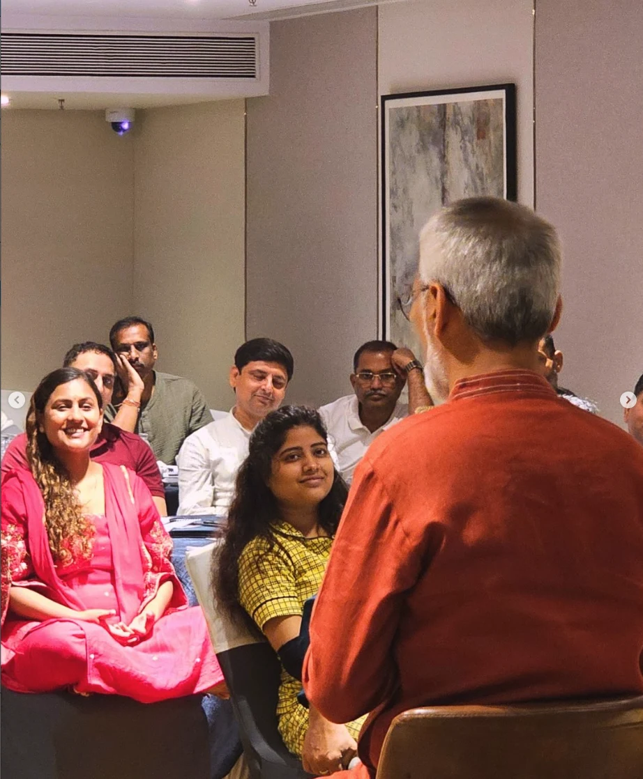 Group of Wellness Vibe participants seated together for Navel Activation session
